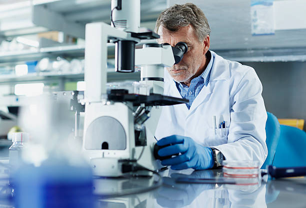 scientist in asbestos lab